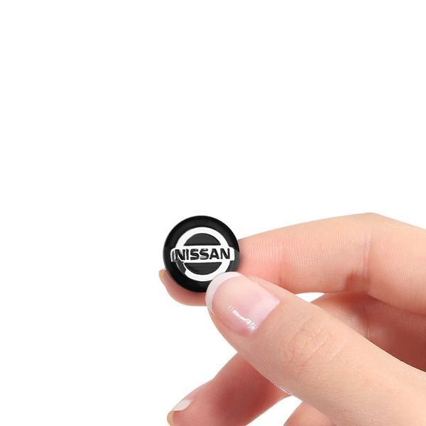 Наклейка с логотипом Nissan для автоключей d=15 мм Пластиковая объемная (Завод) 89386 фото